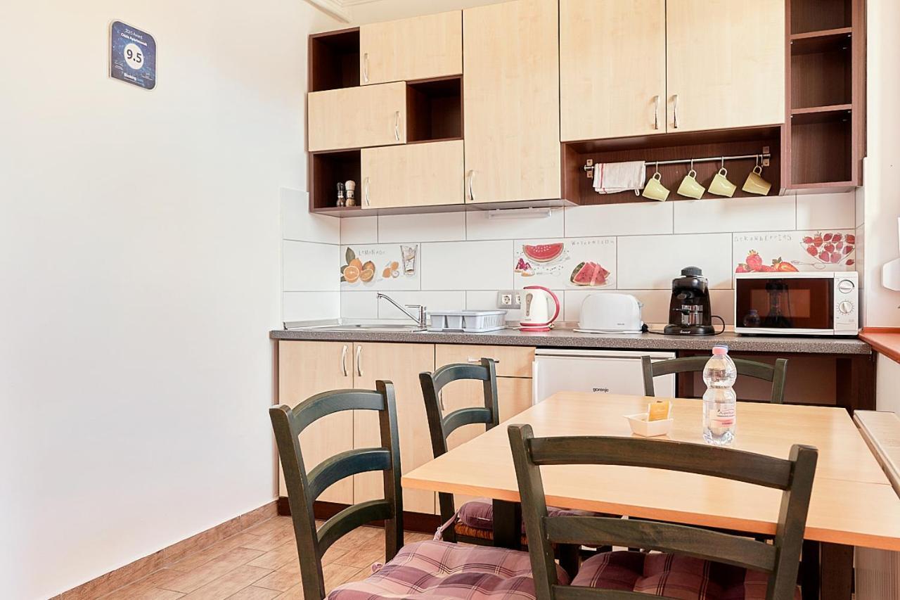 Oazis Apartmanok Морахалом Экстерьер фото
